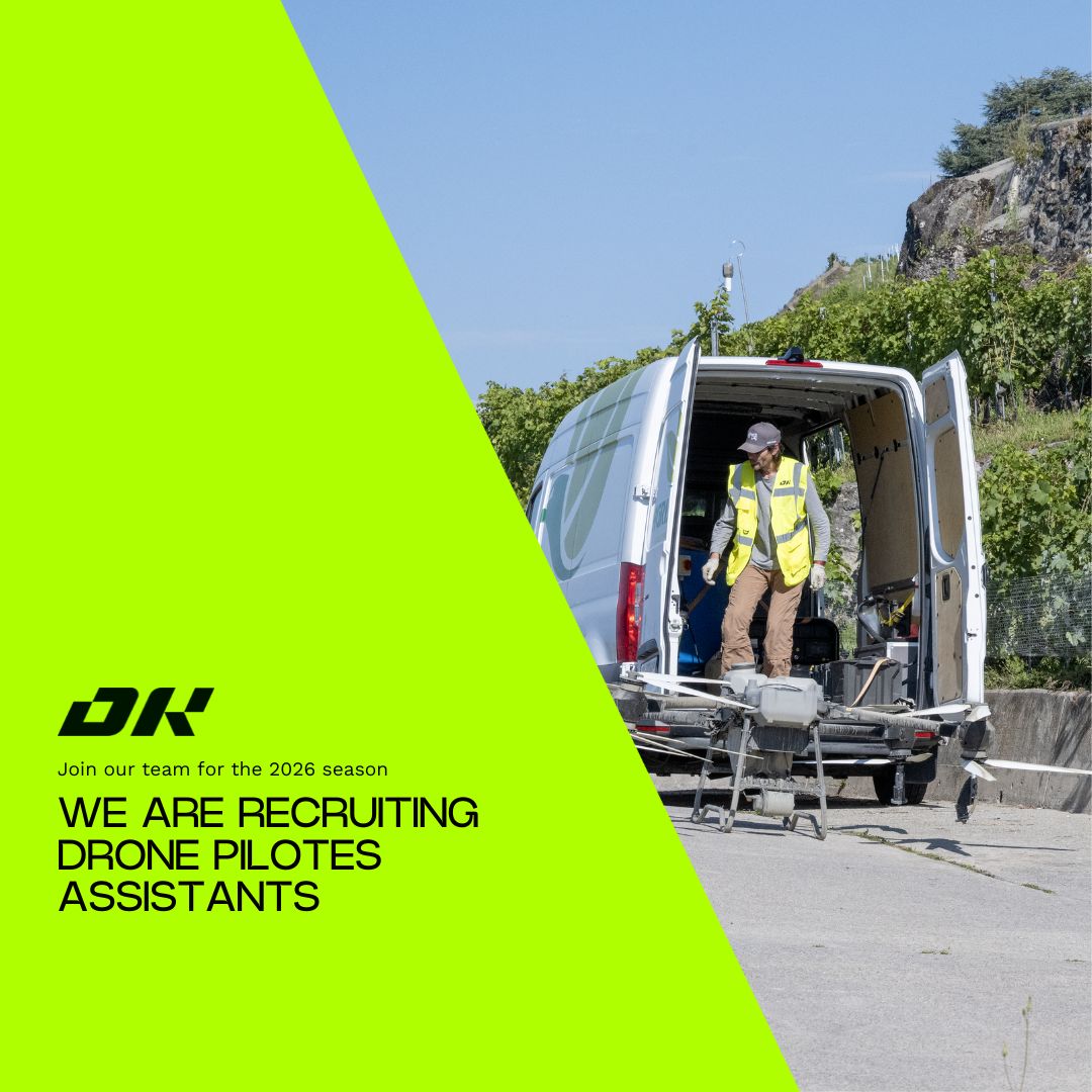 Man in safety vest preparing drone equipment near van — assistant drone pilot job opening 2026.